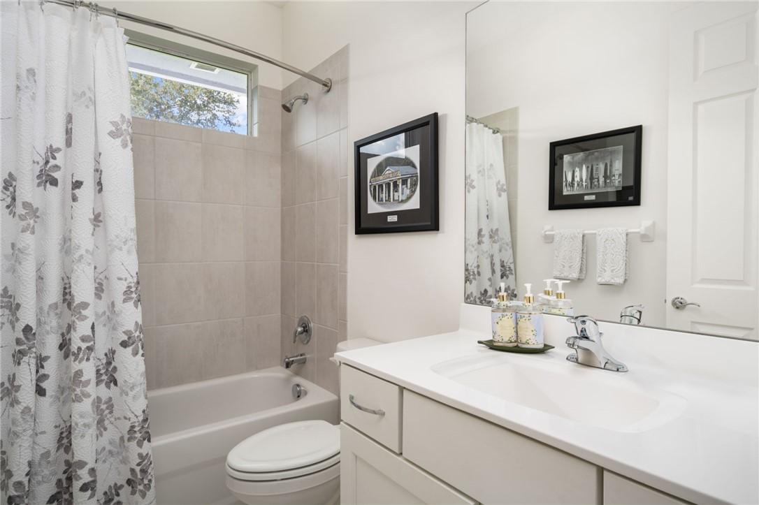 933 Yearling Trail Sebastian, FL 32958 - Photo 34 of 36 a bathroom with a sink a toilet and shower
