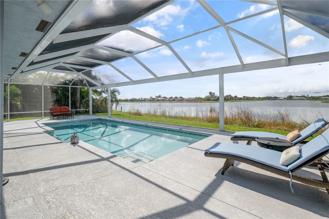 933 Yearling Trail Sebastian, FL 32958 - Photo 8 of 36 a view of a swimming pool with a patio