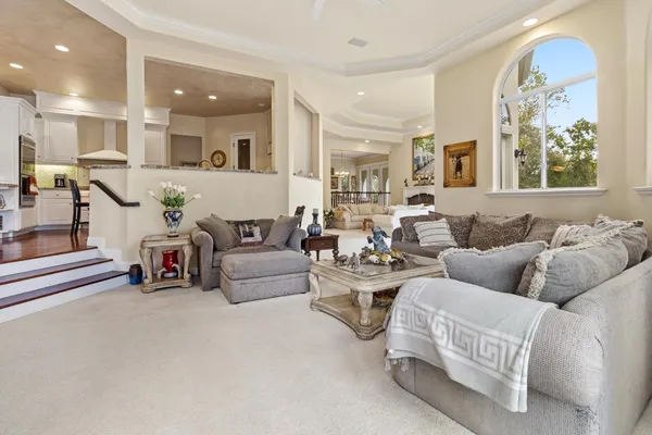 a kitchen with sink stove top oven and microwave