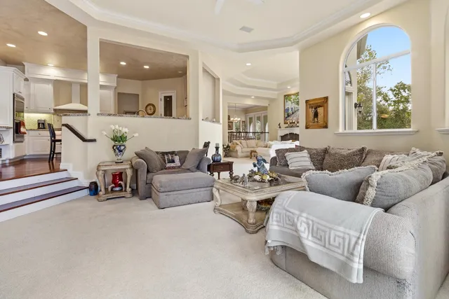 a kitchen with sink stove top oven and microwave