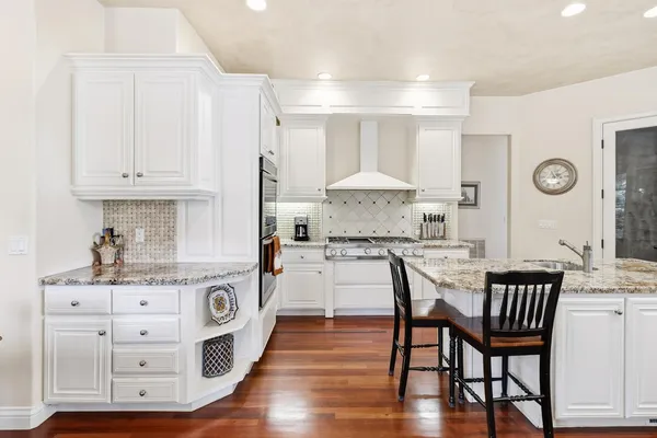 a bedroom with a bed and a desk