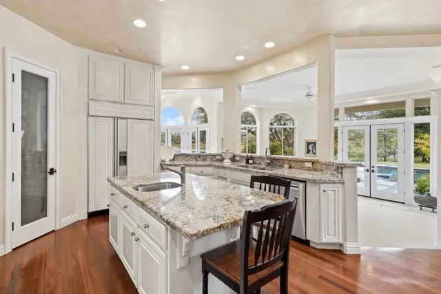 a bedroom with a bed and a desk