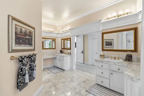 a view of patio with swimming pool and sitting area