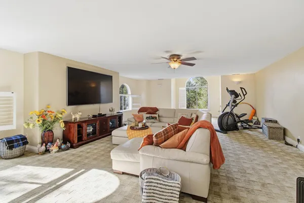 a view of a swimming pool with a yard