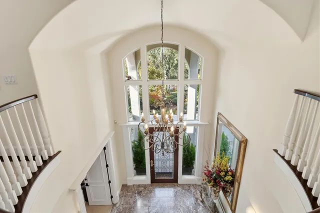 a view of stairs and living room