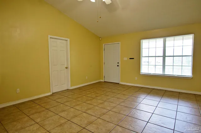 a view of an empty room and window