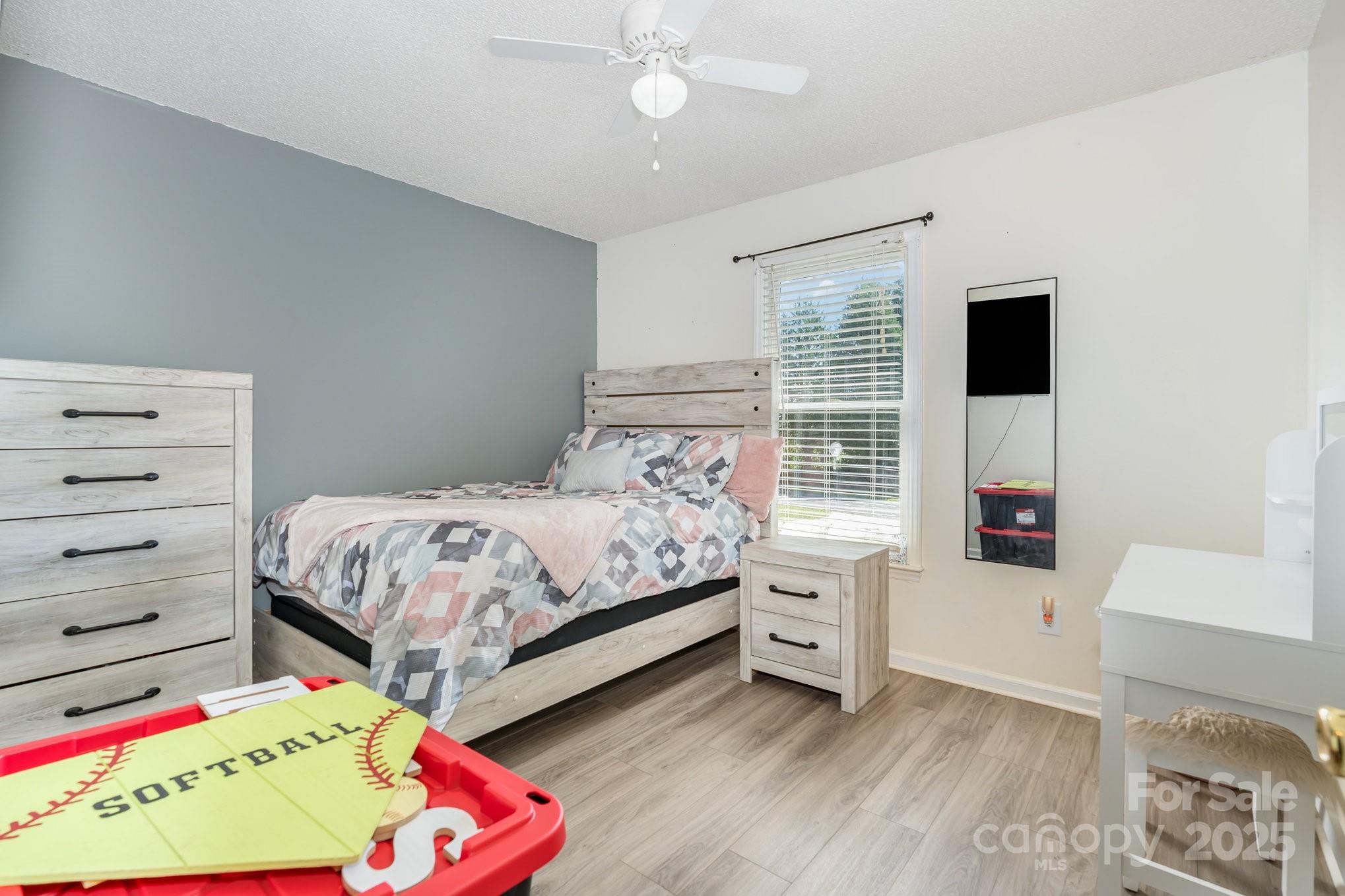 716 McDaniel Road Kings Mountain, NC 28086 - Photo 20 of 35 a bedroom with a bed and a window