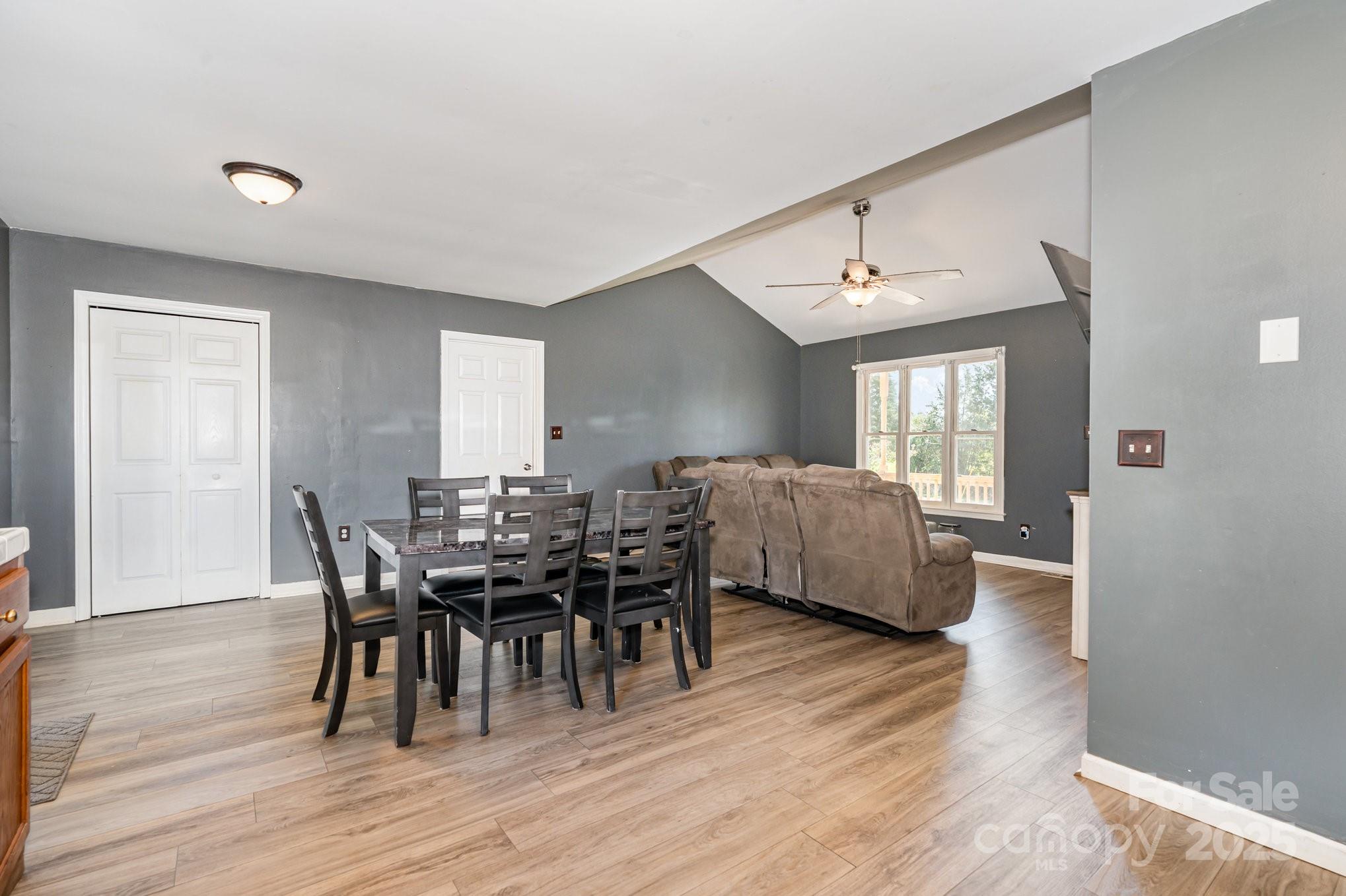 716 McDaniel Road Kings Mountain, NC 28086 - Photo 9 of 35 a view of a dining room with furniture and wooden floor