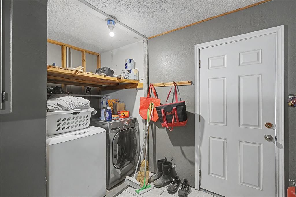 243 County Road 3851 Poolville, TX 76487 - Photo 22 of 34 a view of a storage & utility room