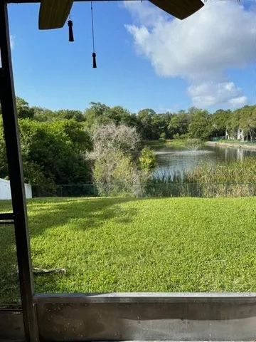 a view of a lake from a yard