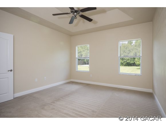 14076 Northwest 10th Road Newberry, FL 32669 - Photo 14 of 22 Master Bedroom w/Tray Ceiling