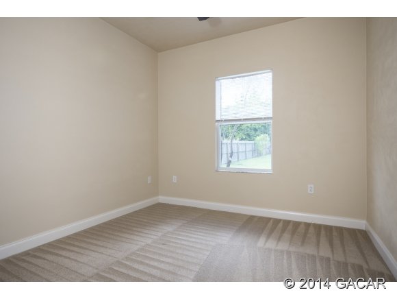14076 Northwest 10th Road Newberry, FL 32669 - Photo 19 of 22 Guest Bedroom