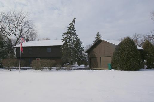 23740 North High Ridge Drive Lake Zurich, IL 60047 - Photo 2 of 17 a view of a house with a yard