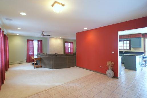 23740 North High Ridge Drive Lake Zurich, IL 60047 - Photo 4 of 17 a living room with furniture and a flat screen tv