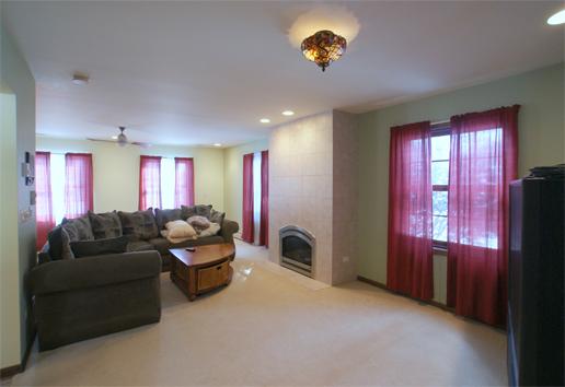 23740 North High Ridge Drive Lake Zurich, IL 60047 - Photo 6 of 17 a living room with furniture a couch and a window
