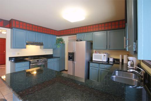 23740 North High Ridge Drive Lake Zurich, IL 60047 - Photo 7 of 17 a kitchen with refrigerator and microwave