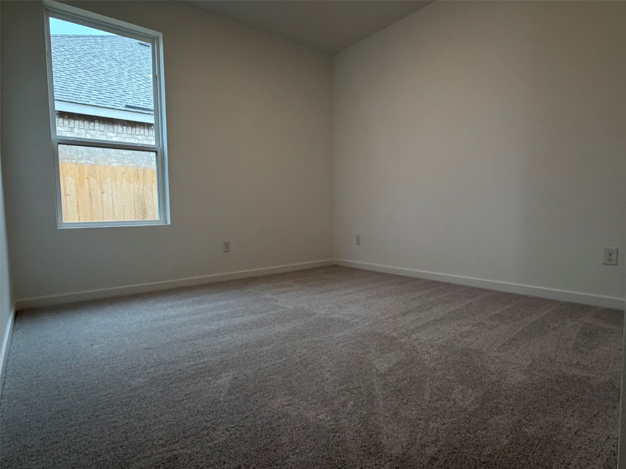 2514 Rose Gold Drive Rosharon, TX 77583 - Photo 21 of 27 an empty room with a window