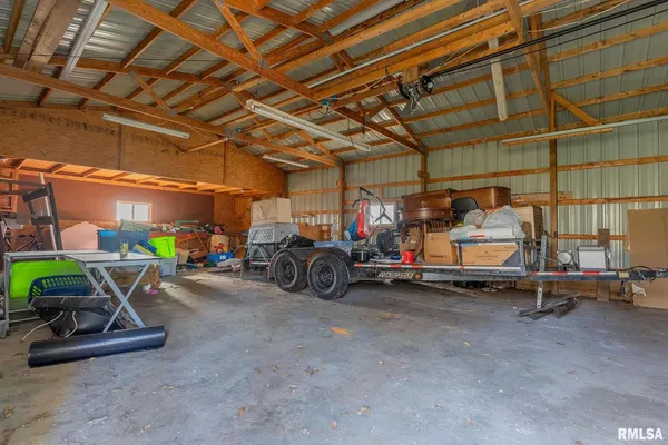 a view of a garage with gym equipment