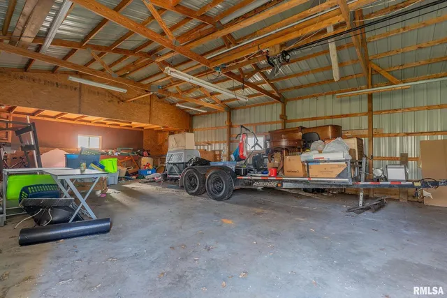 a view of a garage with gym equipment