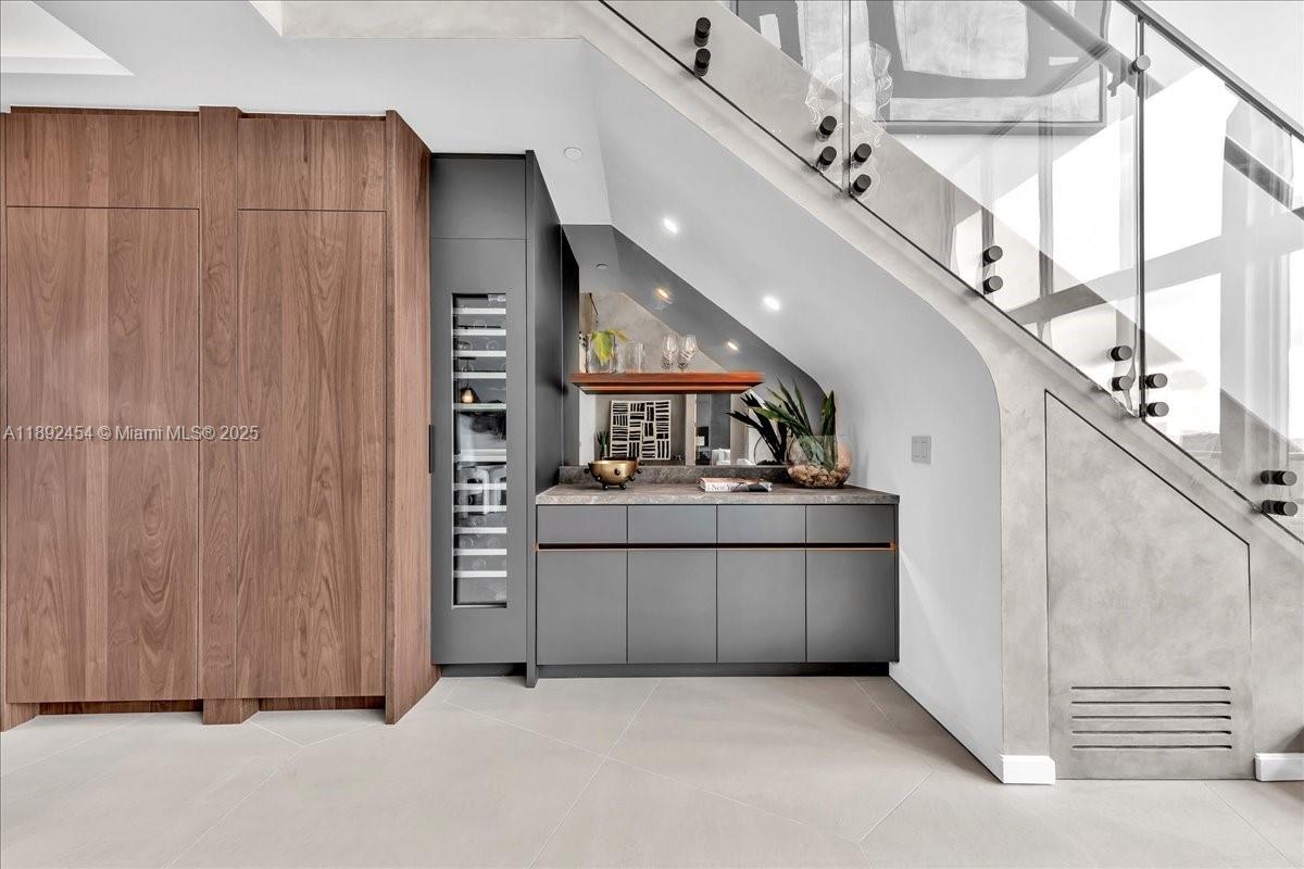 888 Biscayne Boulevard, Unit PH5704 Miami, FL 33132 - Photo 19 of 62 a view of a hallway with washer and dryer