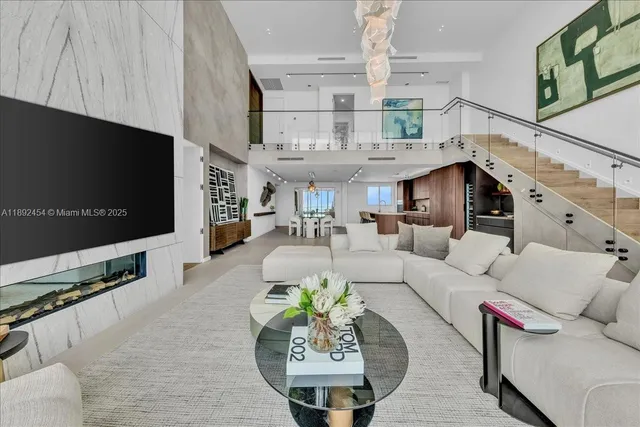 a bedroom with a large bed and a night stand