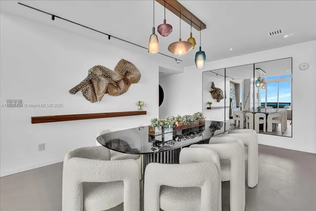 a white tub sitting next to a white wall