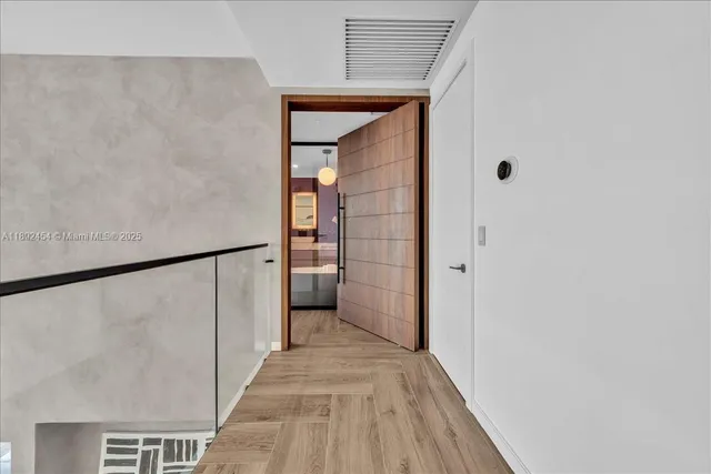 a bathroom with a sink and shower