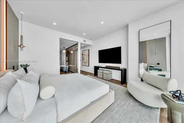 a white bath tub sitting in a bathroom