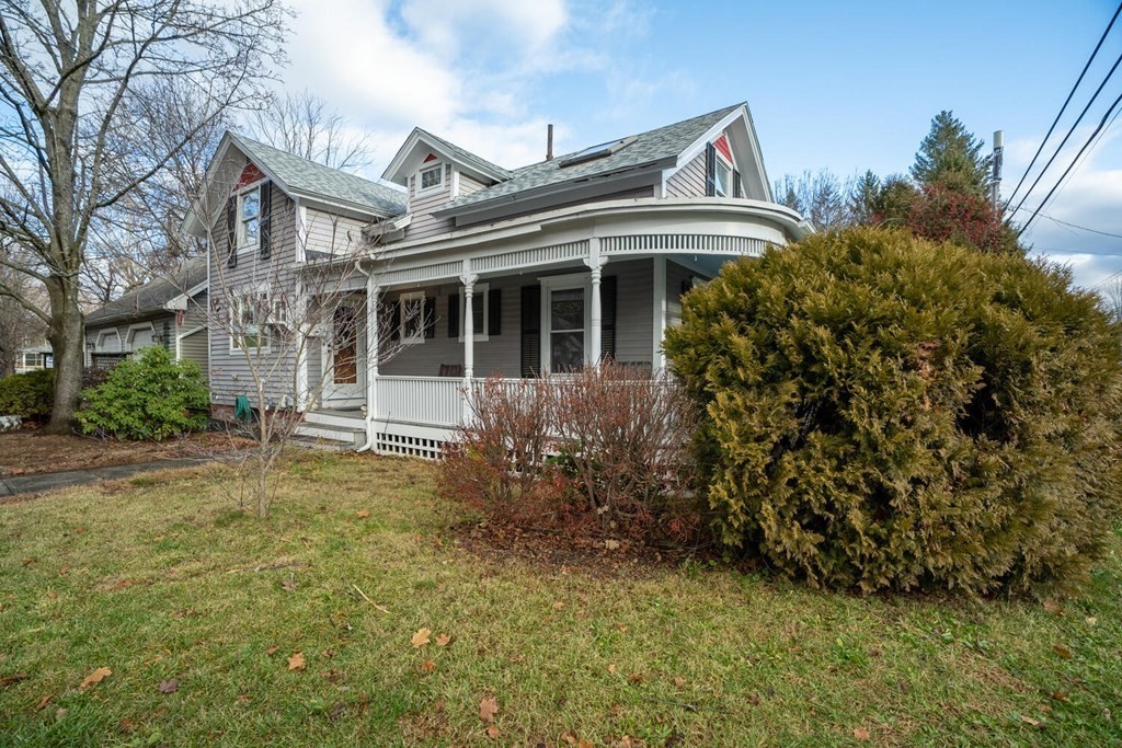 101 Riverside Drive Northampton, MA 01062 - Photo 4 of 42 a view of a house with a small yard and plants