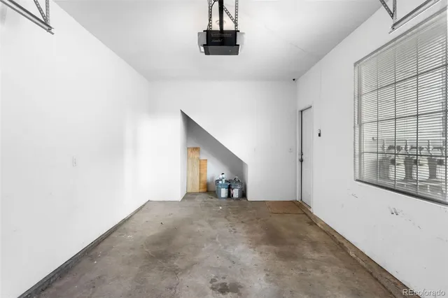 a view of a hallway with a window