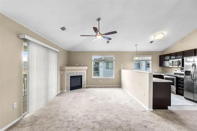 a view of a kitchen with a stove cabinets and a kitchen