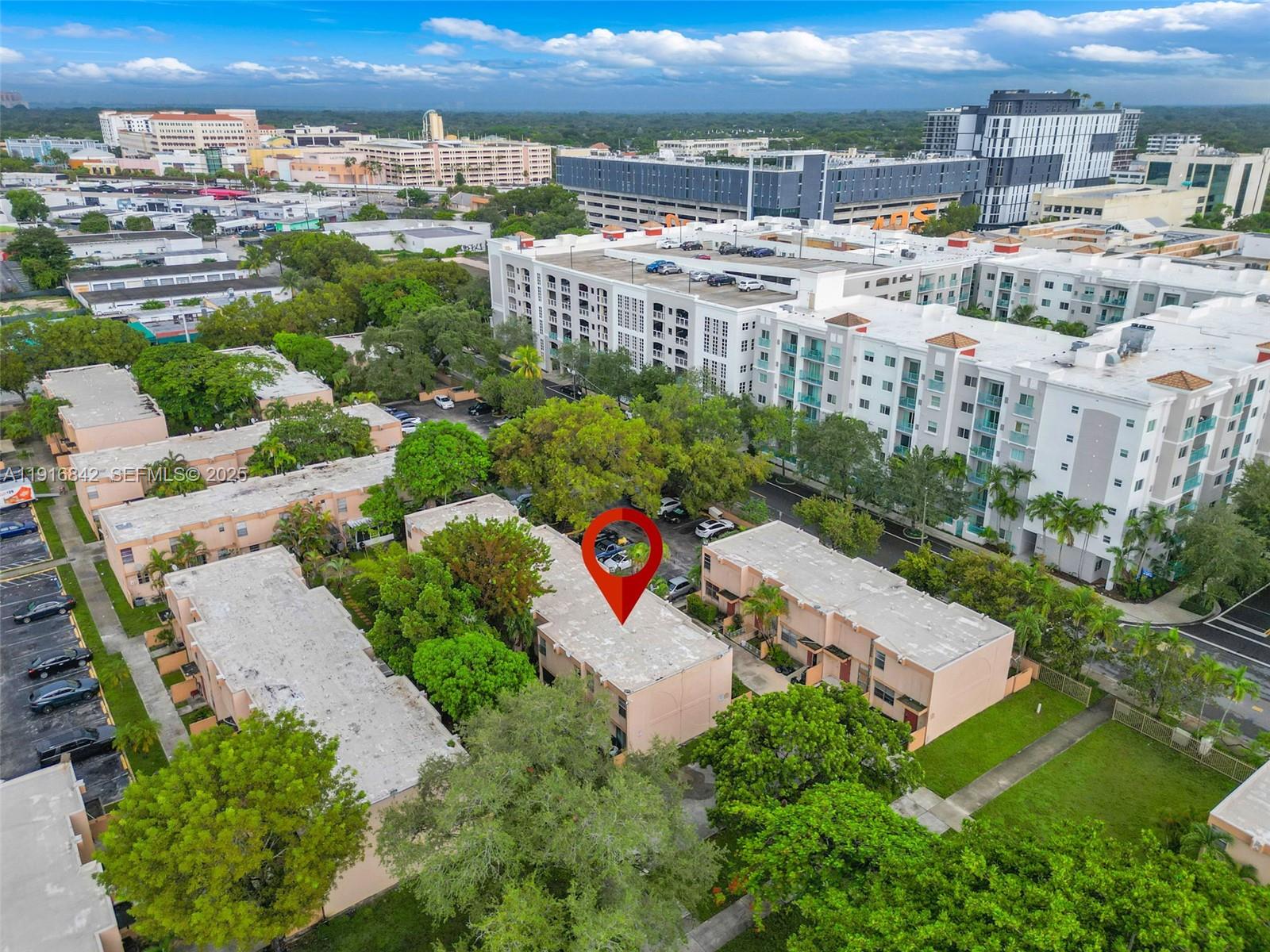 6011 Southwest 69th Street, Unit 72 South Miami, FL 33143 - Photo 21 of 22 an aerial view of multiple house