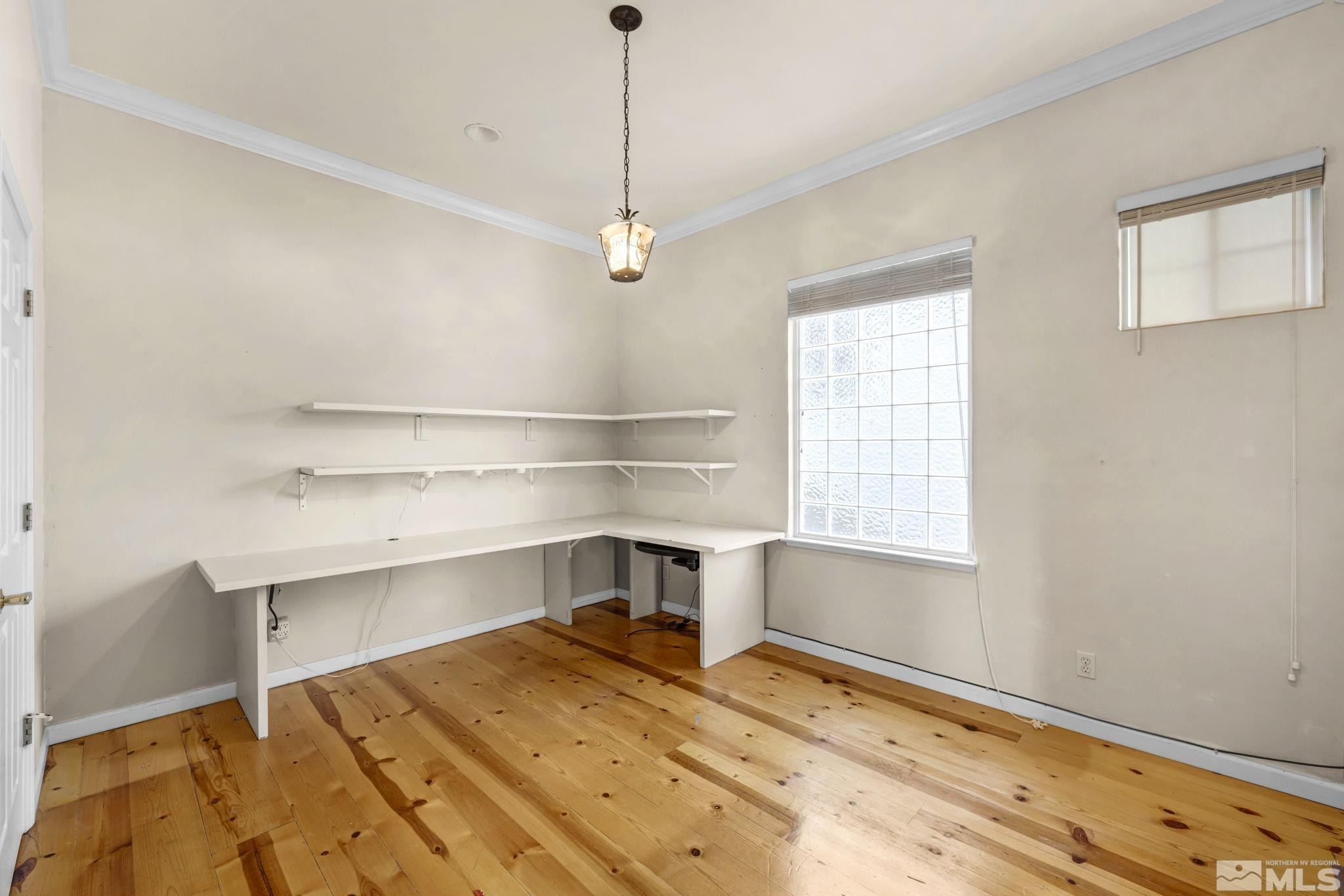 1657 Aspen Creek Road Reno, NV 89519 - Photo 18 of 40 a room with a window and ceiling fan