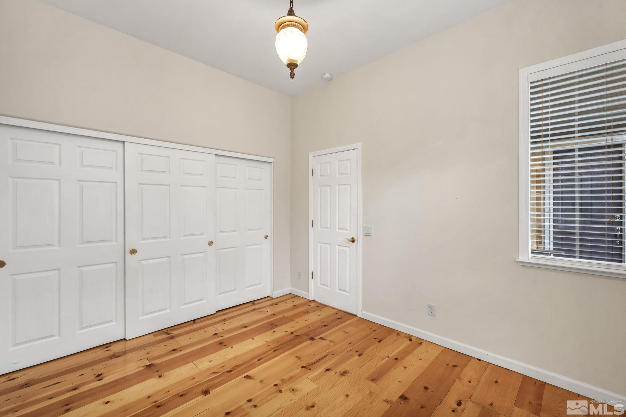 1657 Aspen Creek Road Reno, NV 89519 - Photo 20 of 40 a view of empty room with wooden floor
