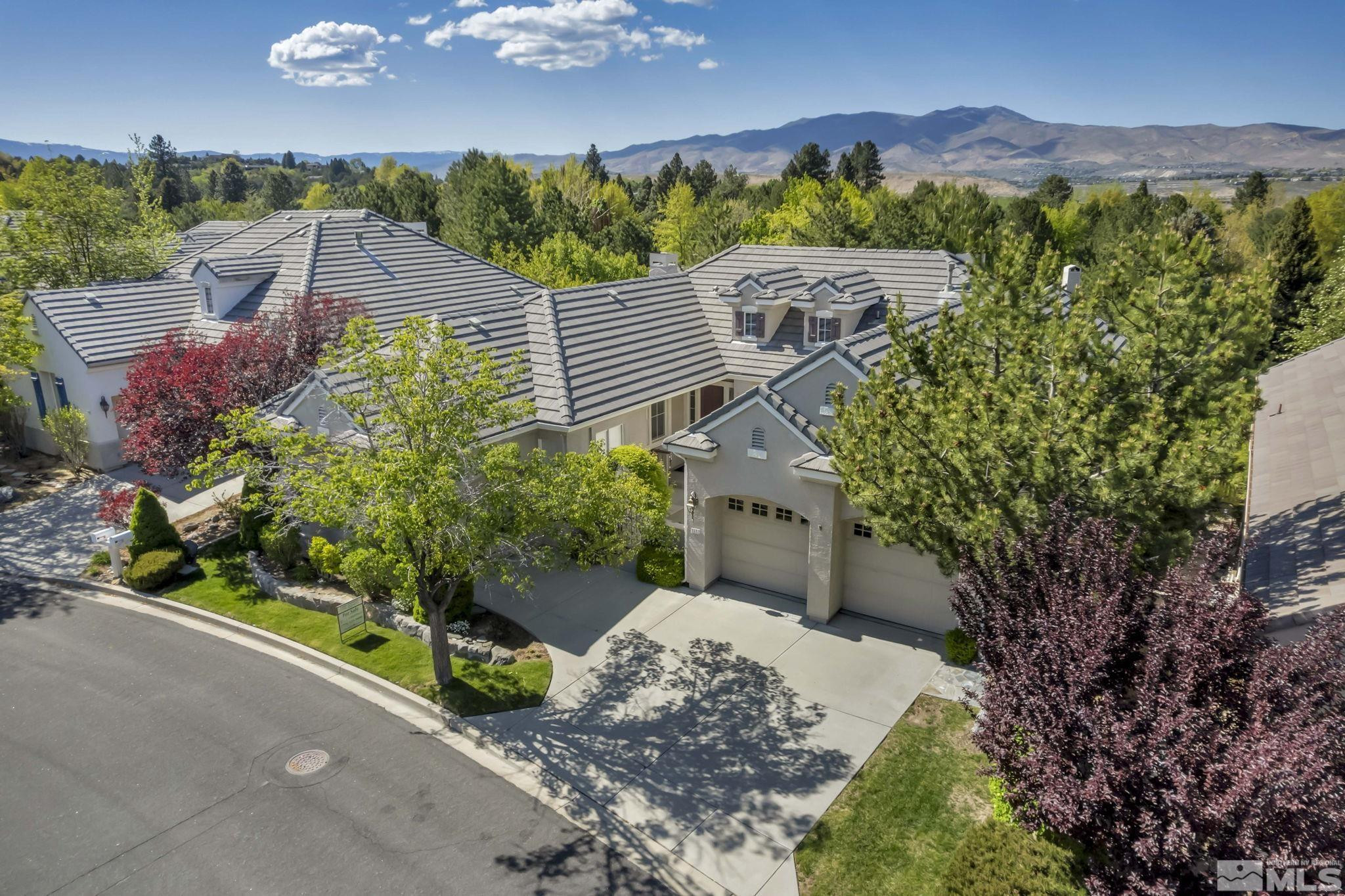 1657 Aspen Creek Road Reno, NV 89519 - Photo 3 of 40 an aerial view of a house with a yard and outdoor seating