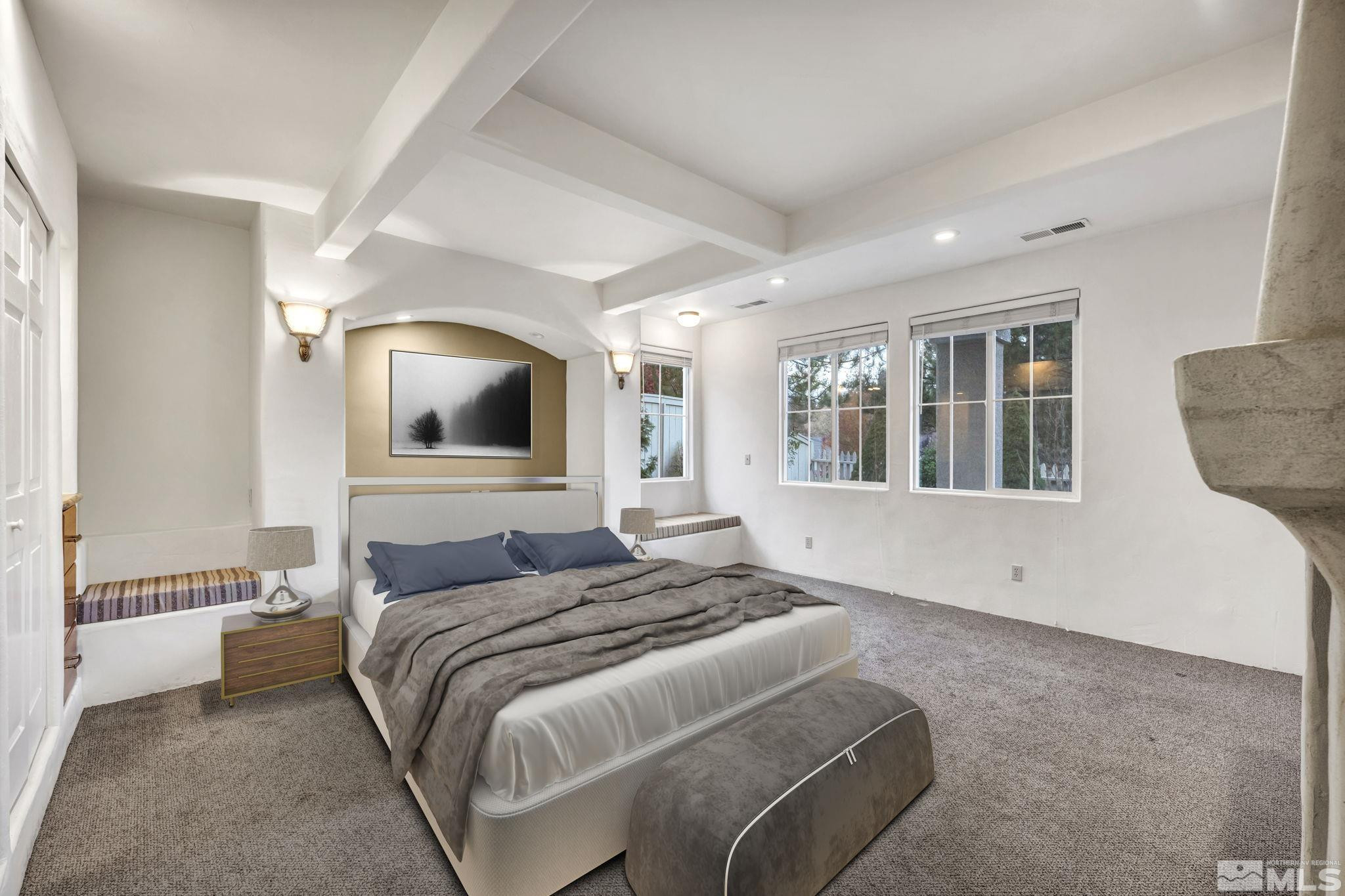 1657 Aspen Creek Road Reno, NV 89519 - Photo 31 of 40 a spacious bedroom with a large bed and a window