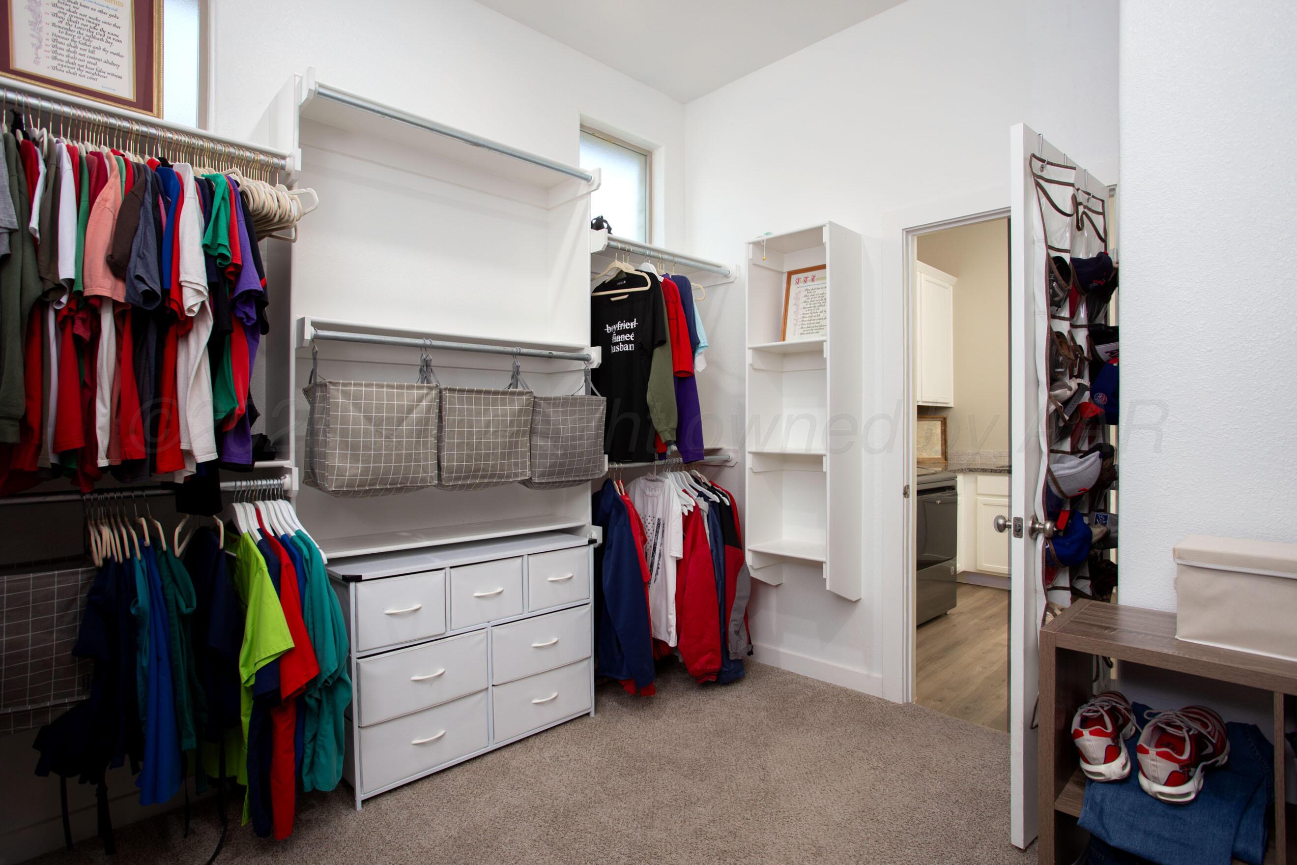 7509 Frazier Road Amarillo, TX 79119 - Photo 15 of 33 Primary Walk-in Closet