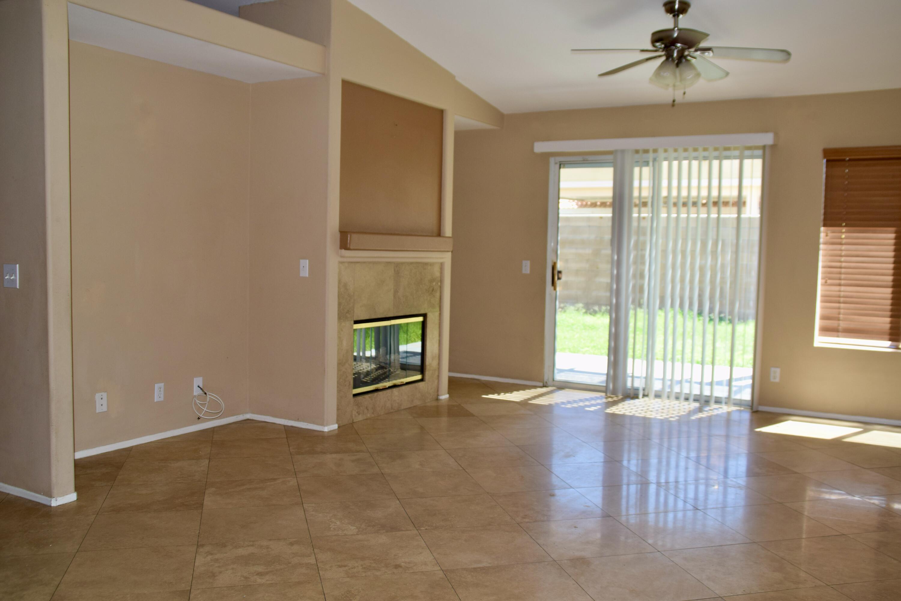 83793 Pacifica Sur Indio, CA 92203 - Photo 12 of 22 a view of an empty room with a window