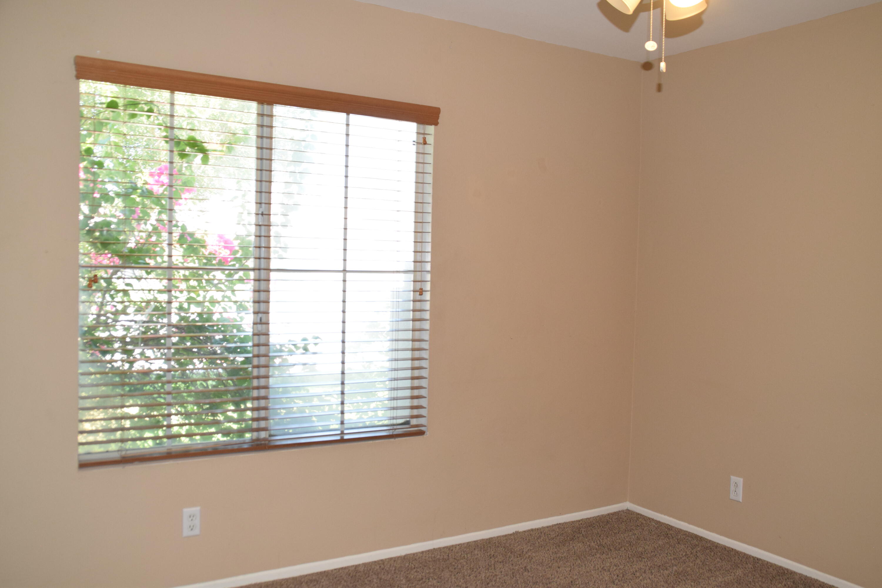 83793 Pacifica Sur Indio, CA 92203 - Photo 13 of 22 a view of an empty room with a window