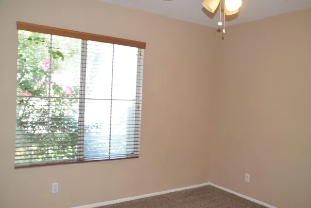 a view of a window in an empty room