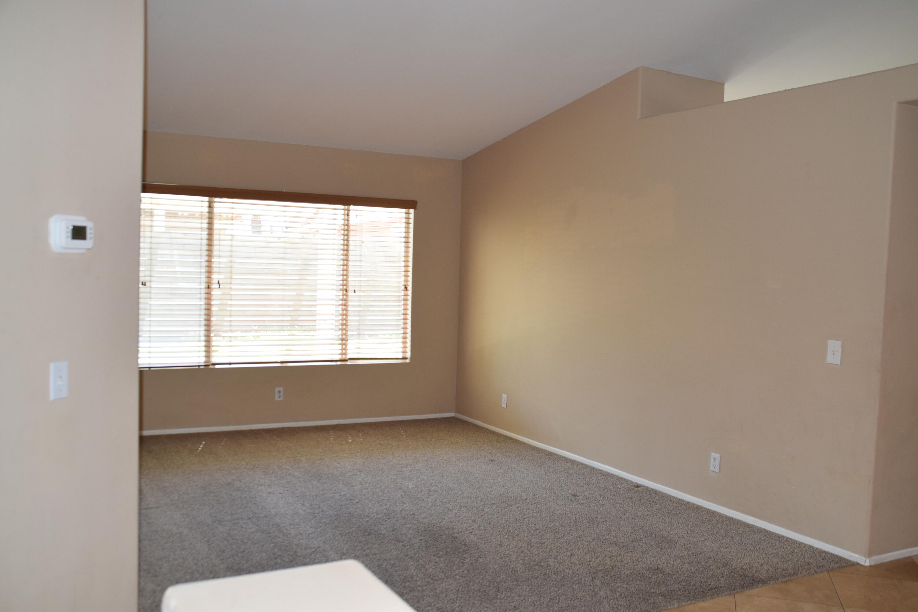83793 Pacifica Sur Indio, CA 92203 - Photo 21 of 22 a view of an empty room with a window