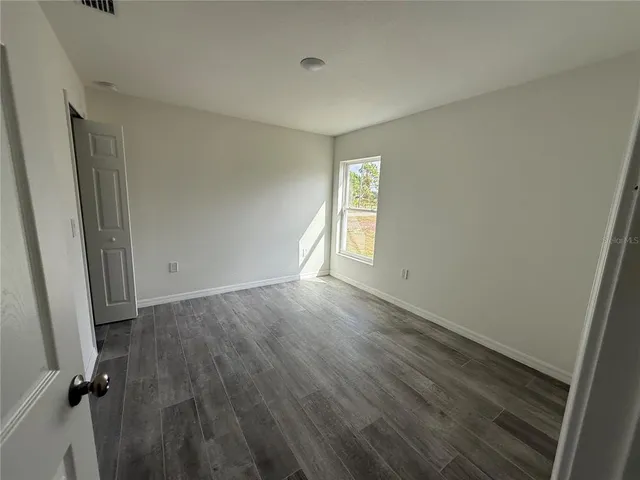 a view of a porch and garden