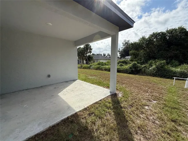 a house with yard in front of it