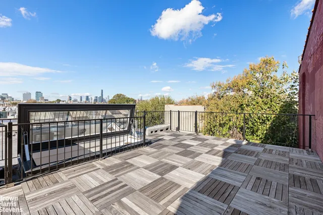 a bathroom with a double vanity sink toilet mirror and shower