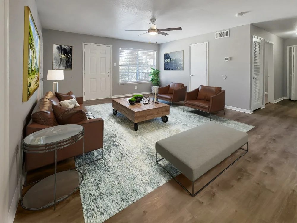 11111 West Montgomery Road, Unit 425 Houston, TX 77088 - Photo 3 of 18 a living room with furniture and a rug