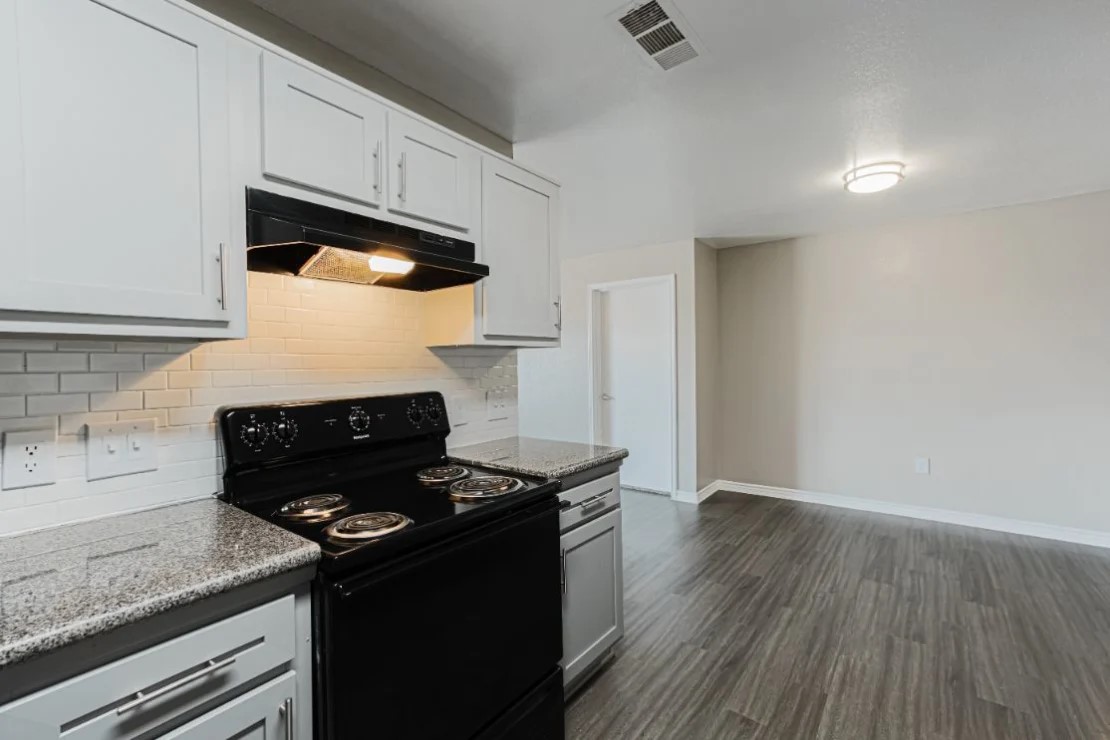 11111 West Montgomery Road, Unit 425 Houston, TX 77088 - Photo 6 of 18 a stove top oven sitting inside of a kitchen