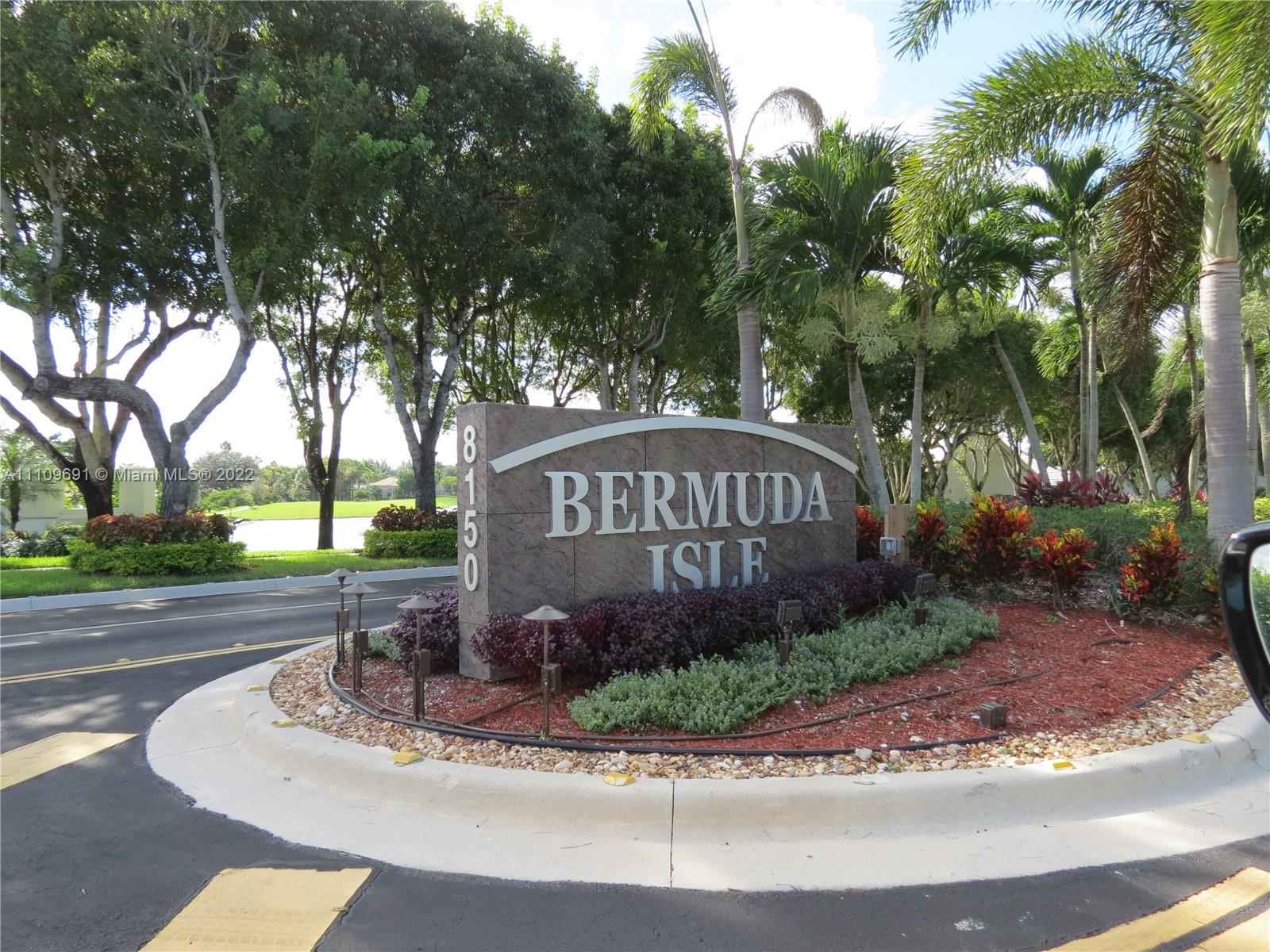 8181 Horseshoe Bay Road Boynton Beach, FL 33472 - Photo 30 of 41 a front view of a house with garden