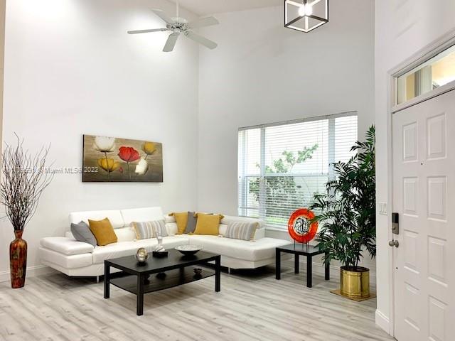 8181 Horseshoe Bay Road Boynton Beach, FL 33472 - Photo 5 of 41 a living room with furniture and a window