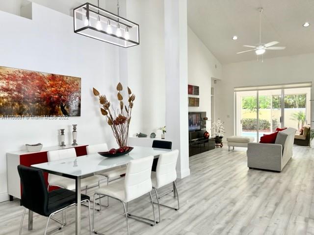 8181 Horseshoe Bay Road Boynton Beach, FL 33472 - Photo 6 of 41 a work room with furniture and wooden floor
