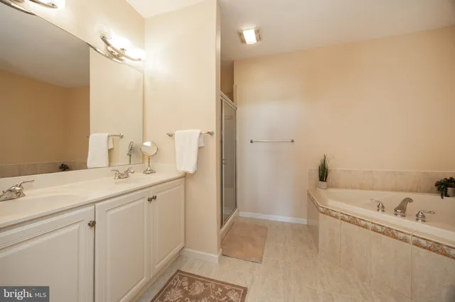 a bathroom with a sink and a bathtub